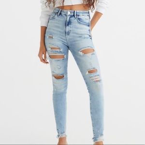 H & M skinny ripped jeans, worn only once and they are as good as new.